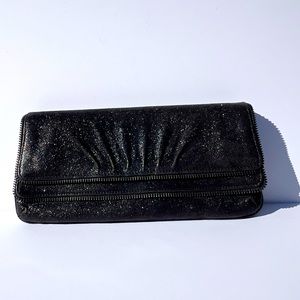 Lauren Merkin Allie Clutch. Black Sparkle Leather. Zipper trim. Double pockets